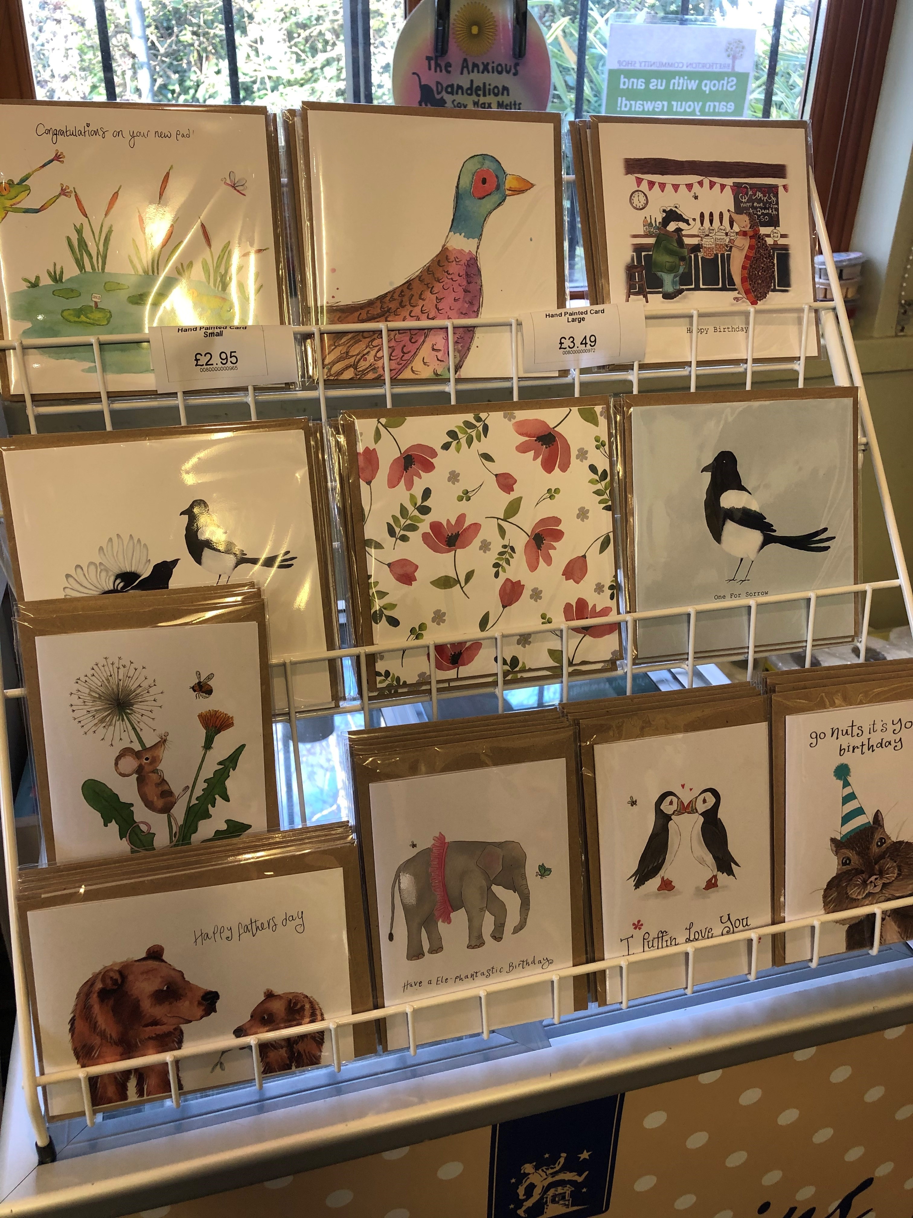 A photo of a rack of greetings cards