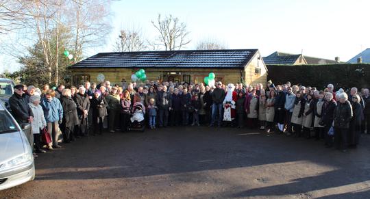 A photo of the crowd outside Bretforton Community Shop at the grand opening