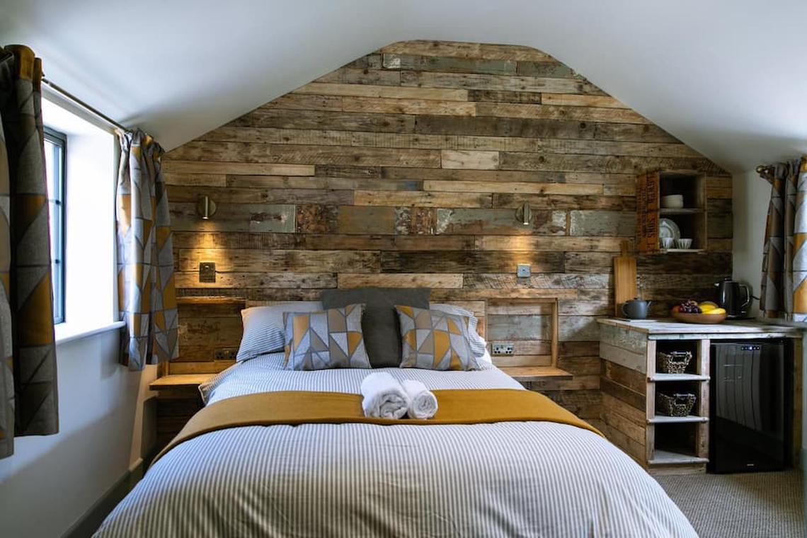 A photo of a bedroom in a rustic holiday let in Bretforton
